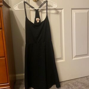 Cute knit black dress. Never worn!